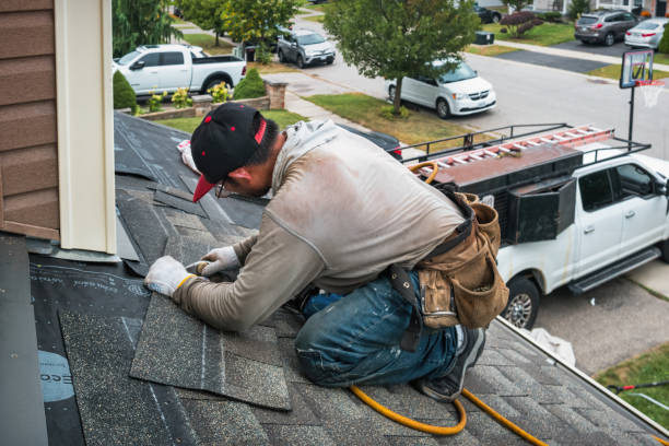 Professional Roofing technician working in Wyoming, DE